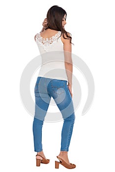 Indian you girl with camisole and jeans hot pant with elegant pose and expression