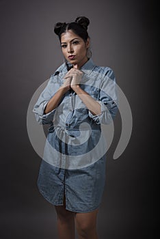 Indian young girl in blue denim one piece and stylish look