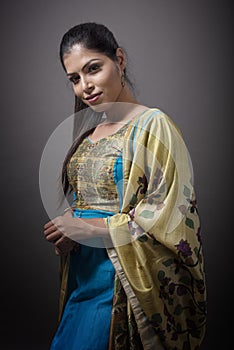 Indian young girl in blue Punjabi traditional dress