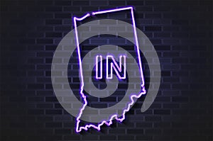 Indiana map glowing neon lamp or glass tube on a black brick wall
