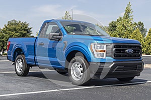 Ford F-150 display at a dealership. The Ford F150 is available in XL, XLT, Lariat, King Ranch, Platinum, and Limited models