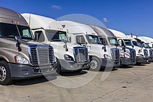 Indianapolis - Circa September 2017: Colorful Semi Tractor Trailer Trucks Lined up for Sale XIX