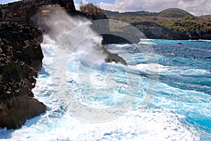 Indic sea waves hitting the cliff rocks at Angelâ€™s Billabong point, an amazing spot close to Broken beach in Nusa Penida Island