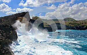 Indic sea waves hitting the cliff rocks at Angelâ€™s Billabong point, an amazing spot close to Broken beach in Nusa Penida Island