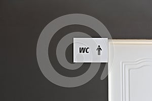 Indicative sign that there is a WC for men near