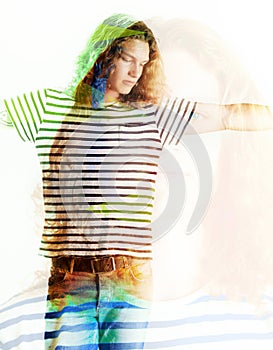 Indie shades. Image of a young man with long, curly hair looking casual - Graphic overlay over the image.