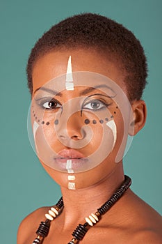 Indigenous Afro American woman in tribal facepaint