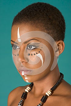 Indigenous Afro American woman in tribal facepaint
