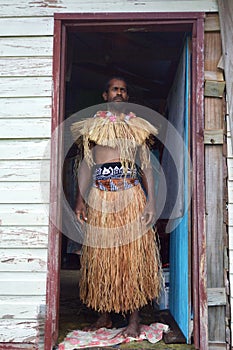 Indigenous Fijian man dressed in traditional Fijian costume