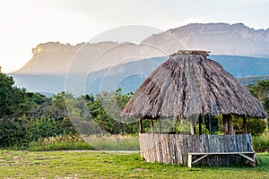 Indigenous hut with Auyan Tepuy at the background. photo