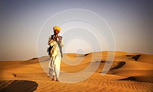 Indigenous Indian Man Playing Wind Pipe Desert Concept