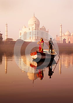 Indigenous Indian Man And Woman On The Boat And A Taj Mahal In T