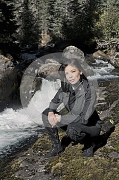 Indigenous Woman by the Creek photo