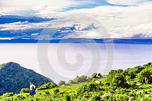 Indigenous woman on isla del sol by lake titicaca - Bolivia