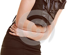 Indigestion. Closeup of woman suffering from stomach pain. photo