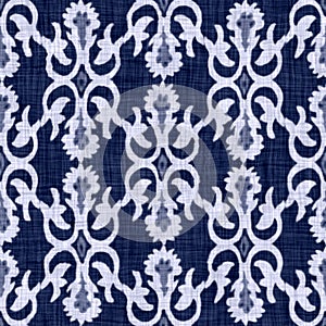 Indigo blue batik damask dyed effect texture background. Seamless japanese repeat pattern swatch. Rose motif wax resist