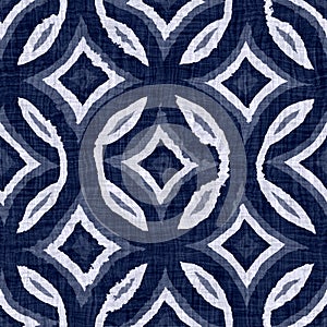 Indigo blue batik dyed effect circle texture background. Seamless japanese style repeat pattern swatch. Painterly leaf