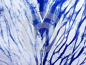 Indigo blue fabric tie dye pattern background.