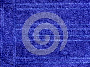 Indigo blue fabric tie dye pattern background.