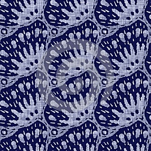 Indigo blue flower block print dyed linen texture background. Seamless woven japanese repeat batik pattern swatch