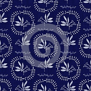 Indigo blue flower block print dyed linen texture background. Seamless woven japanese repeat batik pattern swatch