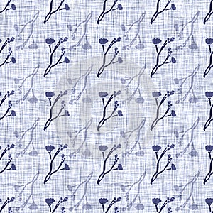 Indigo blue flower block print dyed linen texture background. Seamless woven japanese repeat batik pattern swatch