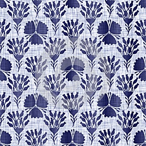 Indigo blue flower block print dyed linen texture background. Seamless woven japanese repeat batik pattern swatch
