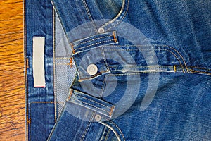 Indigo jeans with a button