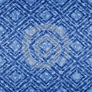Indigo seamless pattern. Mottled transition texture. Blue chambray linen background. Repeated distress weave denim. Repeat textile photo