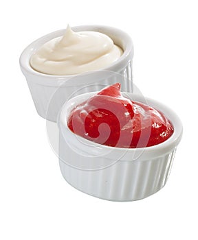 Individual containers of mayo and ketchup