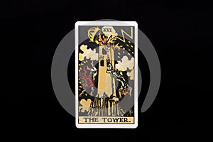 An individual major arcana tarot card isolated on black background. The Tower.