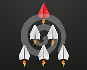 Individual red leader paper plane lead other with fire. Business and leadership