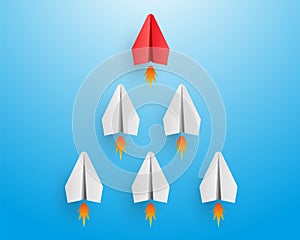 Individual red leader paper plane lead other with fire. Business and leadership concept