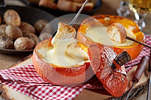 Individual servings of Swiss cheese fondue photo