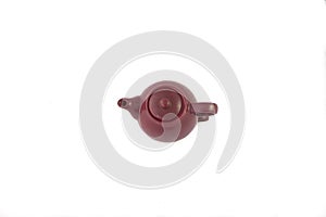 Aerial view of a porcelain teapot on white background. photo