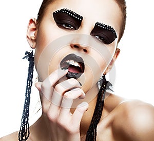 Individuality. Expression. Face of Extraordinary Ultramodern Hippie with Extreme Make-up. Subculture