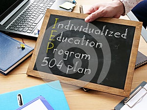 Individualized education program IEP 504 plan is shown on the conceptual business photo