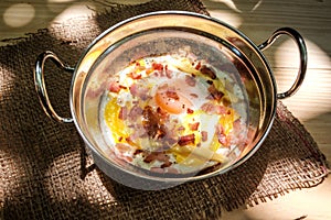Indochina pan-fried egg place on linen weave