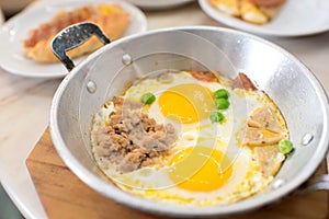 Indochina pan-fried egg with pork and toppings photo