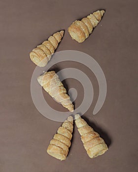 In Indonesia, this cake is known as cumcum cake. A cake shaped like a trumpet, or an ice cream cone.