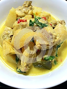 Indonesia dish Yellow curry with chicken potatoe and tofu