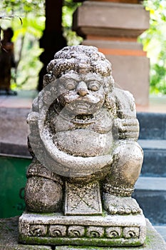 Indonesia God Statue With One Leg Kneels