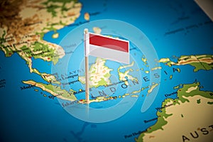 Indonesia marked with a flag on the map