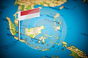 Indonesia marked with a flag on the map