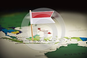 Indonesia marked with a flag on the map