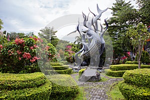 Indonesia. Surabaya. Monument `the shark and the crocodile` as the symbol of Surabaya.