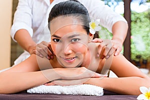 Indonesian Asian woman in wellness beauty day spa