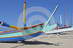 Indonesian Balinese fishing boats on Sanur Beach Bali Indonesia