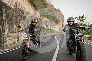 indonesian bikers traveling together riding motorcycle