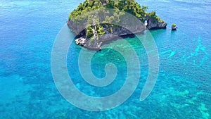 Indonesian Boats and Small Tropical Island. Aerial View